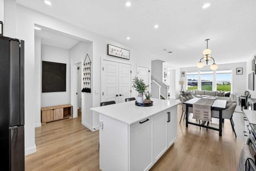 87 Heirloom Boulevard Se, Calgary, AB - Indoor Photo Showing Kitchen With Upgraded Kitchen