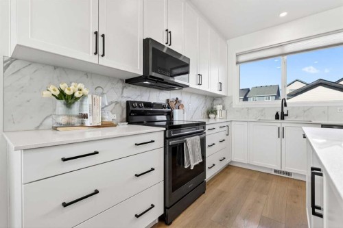 87 Heirloom Boulevard Se, Calgary, AB - Indoor Photo Showing Kitchen