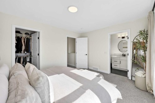 87 Heirloom Boulevard Se, Calgary, AB - Indoor Photo Showing Bedroom