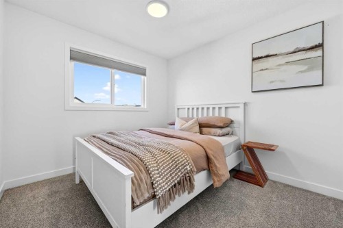 87 Heirloom Boulevard Se, Calgary, AB - Indoor Photo Showing Bedroom