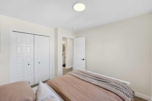 87 Heirloom Boulevard Se, Calgary, AB - Indoor Photo Showing Bedroom