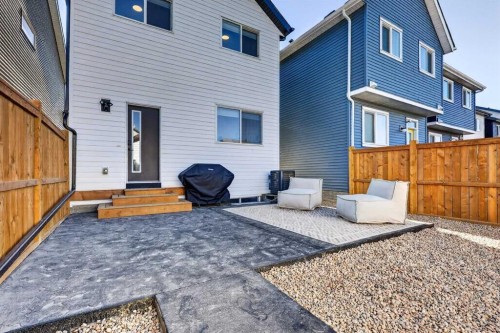 87 Heirloom Boulevard Se, Calgary, AB - Outdoor With Deck Patio Veranda With Exterior