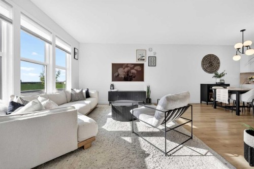 87 Heirloom Boulevard Se, Calgary, AB - Indoor Photo Showing Living Room