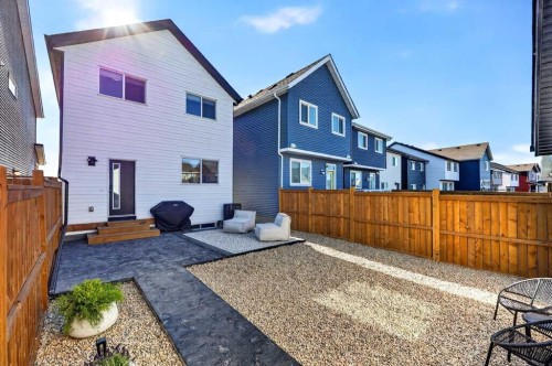 87 Heirloom Boulevard Se, Calgary, AB - Outdoor With Deck Patio Veranda With Exterior