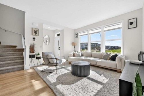 87 Heirloom Boulevard Se, Calgary, AB - Indoor Photo Showing Living Room