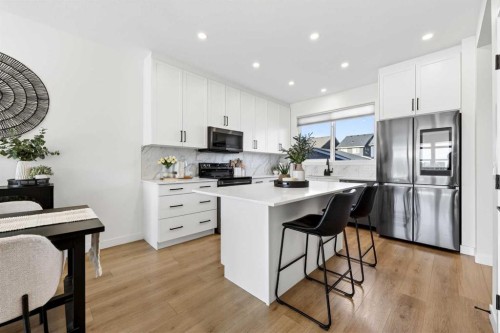 87 Heirloom Boulevard Se, Calgary, AB - Indoor Photo Showing Kitchen With Upgraded Kitchen