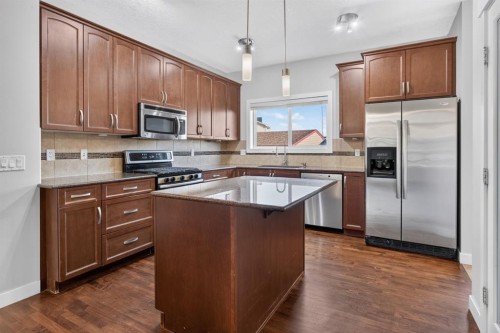 22 Panora Road Nw, Calgary, AB - Indoor Photo Showing Kitchen With Stainless Steel Kitchen