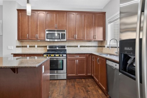 22 Panora Road Nw, Calgary, AB - Indoor Photo Showing Kitchen With Stainless Steel Kitchen