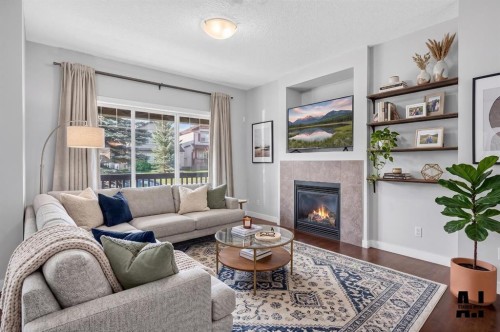 22 Panora Road Nw, Calgary, AB - Indoor Photo Showing Living Room With Fireplace