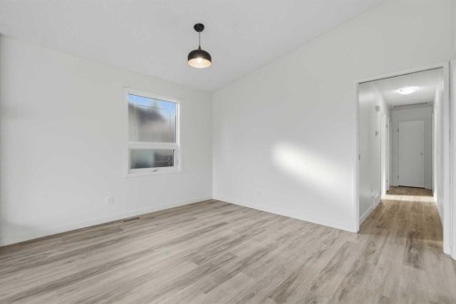 731 Queensland Drive Se, Calgary, AB - Indoor Photo Showing Other Room