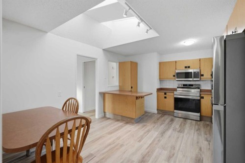 731 Queensland Drive Se, Calgary, AB - Indoor Photo Showing Other Room