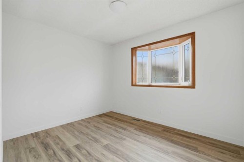 731 Queensland Drive Se, Calgary, AB - Indoor Photo Showing Other Room