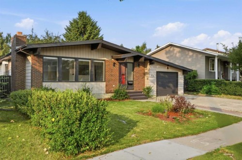 731 Queensland Drive Se, Calgary, AB - Outdoor With Facade