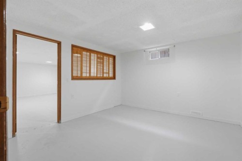 731 Queensland Drive Se, Calgary, AB - Indoor Photo Showing Other Room