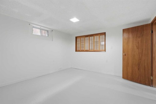 731 Queensland Drive Se, Calgary, AB - Indoor Photo Showing Other Room