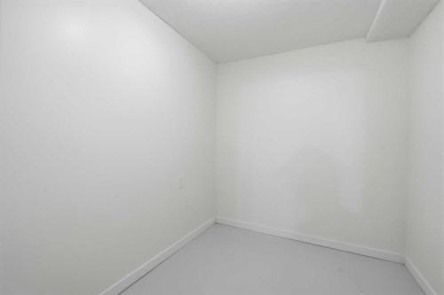 731 Queensland Drive Se, Calgary, AB - Indoor Photo Showing Other Room