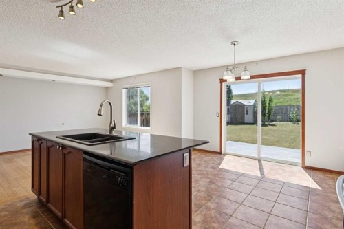 172 Kincora Drive Nw, Calgary, AB - Indoor Photo Showing Kitchen With Double Sink