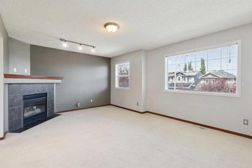 172 Kincora Drive Nw, Calgary, AB - Indoor With Fireplace