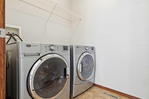 172 Kincora Drive Nw, Calgary, AB - Indoor Photo Showing Laundry Room
