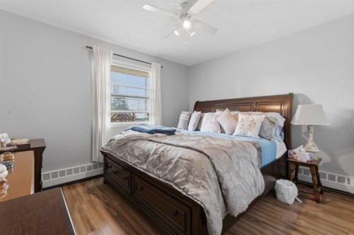 208-105 7 Avenue Se, High River, AB - Indoor Photo Showing Bedroom