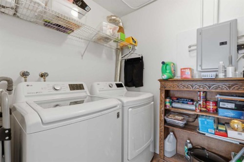 208-105 7 Avenue Se, High River, AB - Indoor Photo Showing Laundry Room