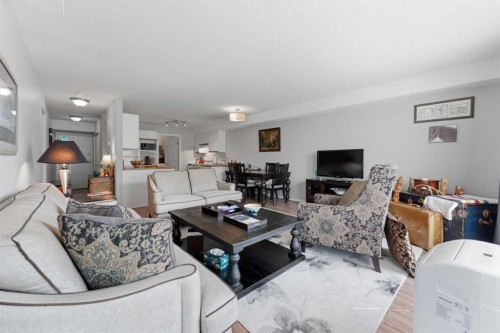 208-105 7 Avenue Se, High River, AB - Indoor Photo Showing Living Room