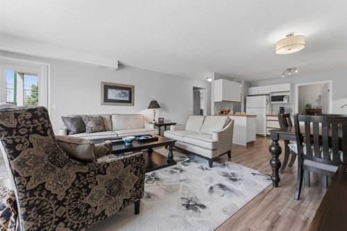 208-105 7 Avenue Se, High River, AB - Indoor Photo Showing Living Room