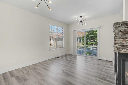47 Christie Park Terrace Sw, Calgary, AB - Indoor With Fireplace
