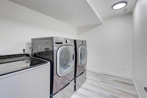 47 Christie Park Terrace Sw, Calgary, AB - Indoor Photo Showing Laundry Room