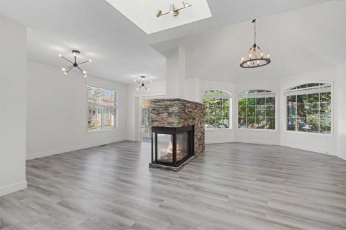 47 Christie Park Terrace Sw, Calgary, AB - Indoor Photo Showing Living Room With Fireplace
