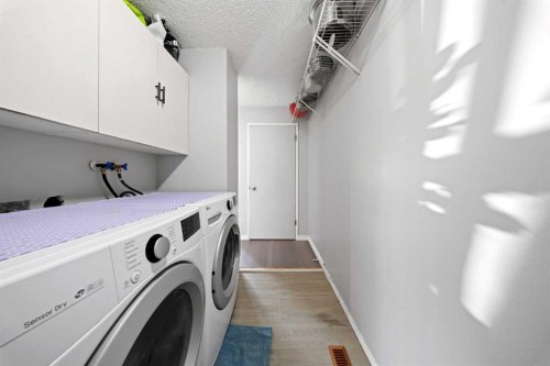 32 Shawmeadows Road Sw, Calgary, AB - Indoor Photo Showing Laundry Room