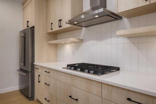 15 Alpine Green Sw, Calgary, AB - Indoor Photo Showing Kitchen