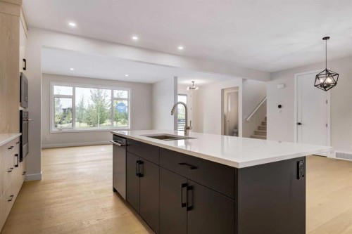 15 Alpine Green Sw, Calgary, AB - Indoor Photo Showing Kitchen