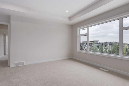 15 Alpine Green Sw, Calgary, AB - Indoor Photo Showing Other Room