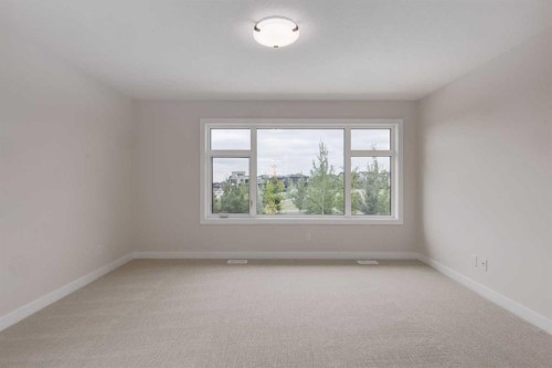 15 Alpine Green Sw, Calgary, AB - Indoor Photo Showing Other Room
