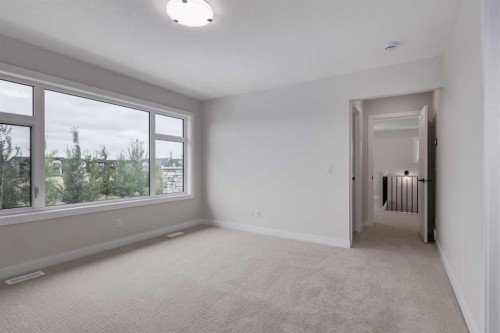 15 Alpine Green Sw, Calgary, AB - Indoor Photo Showing Other Room