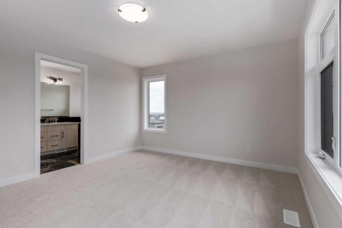 15 Alpine Green Sw, Calgary, AB - Indoor Photo Showing Other Room