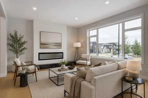 15 Alpine Green Sw, Calgary, AB - Indoor Photo Showing Living Room
