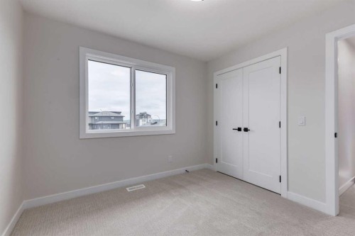15 Alpine Green Sw, Calgary, AB - Indoor Photo Showing Other Room