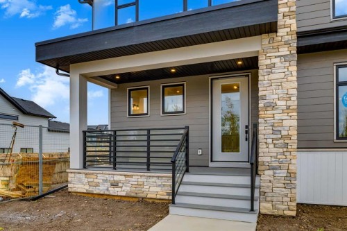15 Alpine Green Sw, Calgary, AB - Outdoor With Deck Patio Veranda