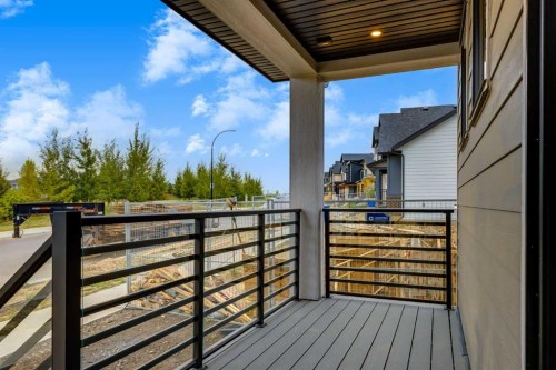 15 Alpine Green Sw, Calgary, AB - Outdoor With Deck Patio Veranda With Exterior