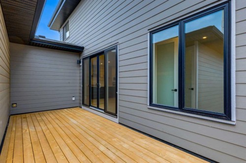 15 Alpine Green Sw, Calgary, AB - Outdoor With Deck Patio Veranda With Exterior