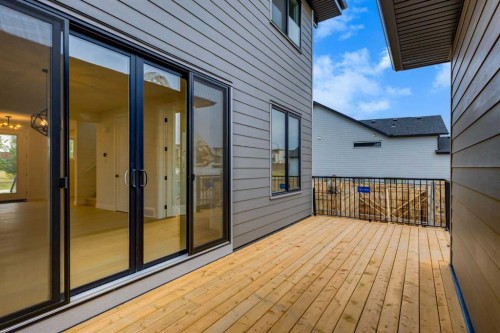 15 Alpine Green Sw, Calgary, AB - Outdoor With Deck Patio Veranda With Exterior