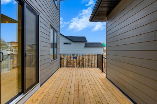 15 Alpine Green Sw, Calgary, AB - Outdoor With Deck Patio Veranda With Exterior