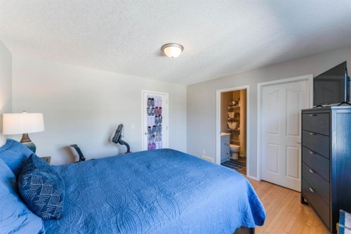 82 West Springs Way Sw, Calgary, AB - Indoor Photo Showing Bedroom