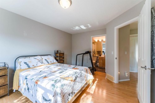82 West Springs Way Sw, Calgary, AB - Indoor Photo Showing Bedroom