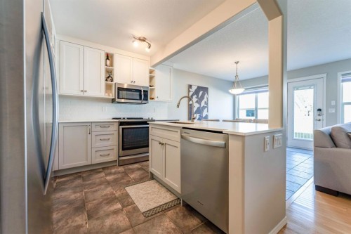 82 West Springs Way Sw, Calgary, AB - Indoor Photo Showing Kitchen With Stainless Steel Kitchen With Upgraded Kitchen