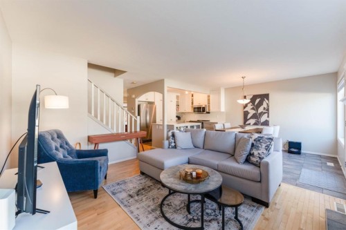 82 West Springs Way Sw, Calgary, AB - Indoor Photo Showing Living Room