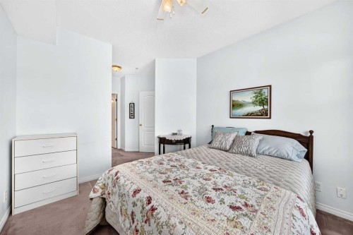 210-78 Prestwick Gardens Se, Calgary, AB - Indoor Photo Showing Bedroom