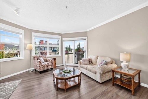 210-78 Prestwick Gardens Se, Calgary, AB - Indoor Photo Showing Living Room